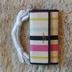 NWT. Kate Spade striped trifold crossbody wallet.
